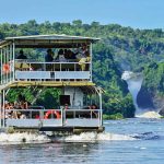 Complete guide to Murchison Falls National Park Uganda 2026 — the world's most powerful waterfall, game drives, Nile boat safari, giraffes, lions and best lodges. Go Safaris Africa.